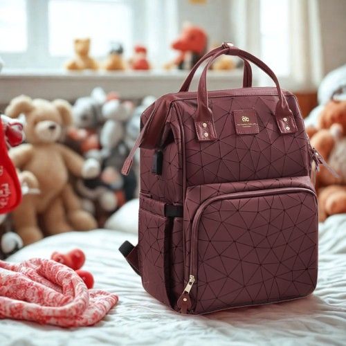 sac a dos a langer rouge avec peluches