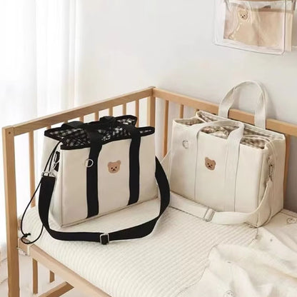 Sac a langer sur un lit