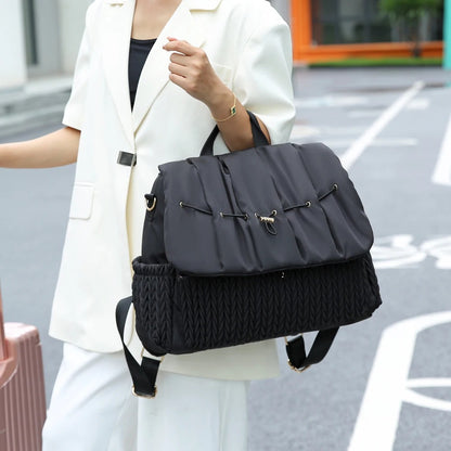 sac a langer au bras